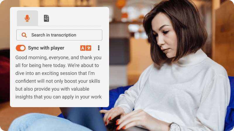 A woman reading the AI-generated transcription of a video.