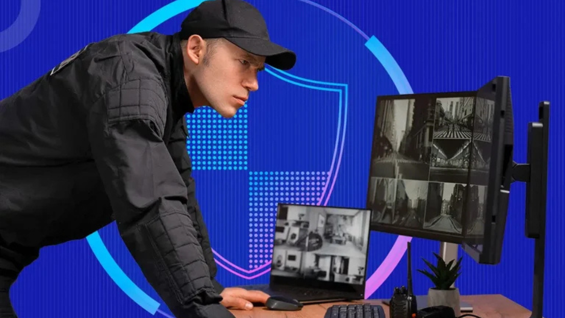 A security officer using multi stream view to monitor multiple surveillance feeds on a computer and laptop, representing AI-powered video evidence management.