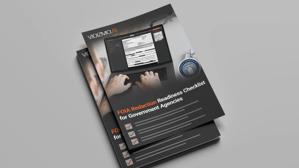 A government compliance officer reviews a digital checklist designed to ensure FOIA-compliant redaction across video, audio, and document records. 