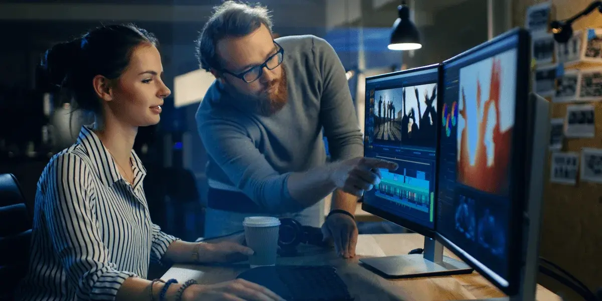 Two people using video, emphasizing upon its importance.