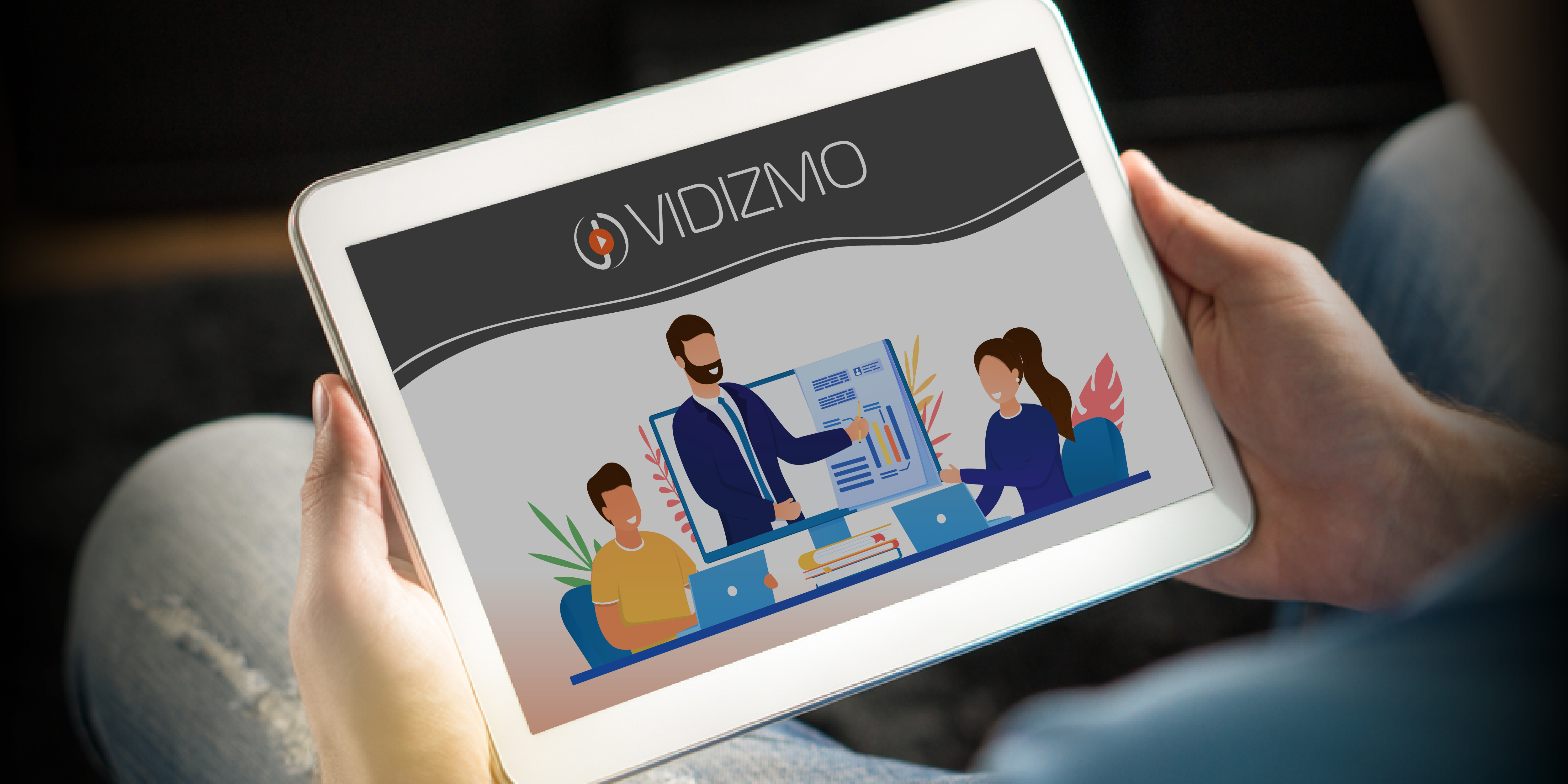 VIDIZMO logo and animated art on a tablet PC