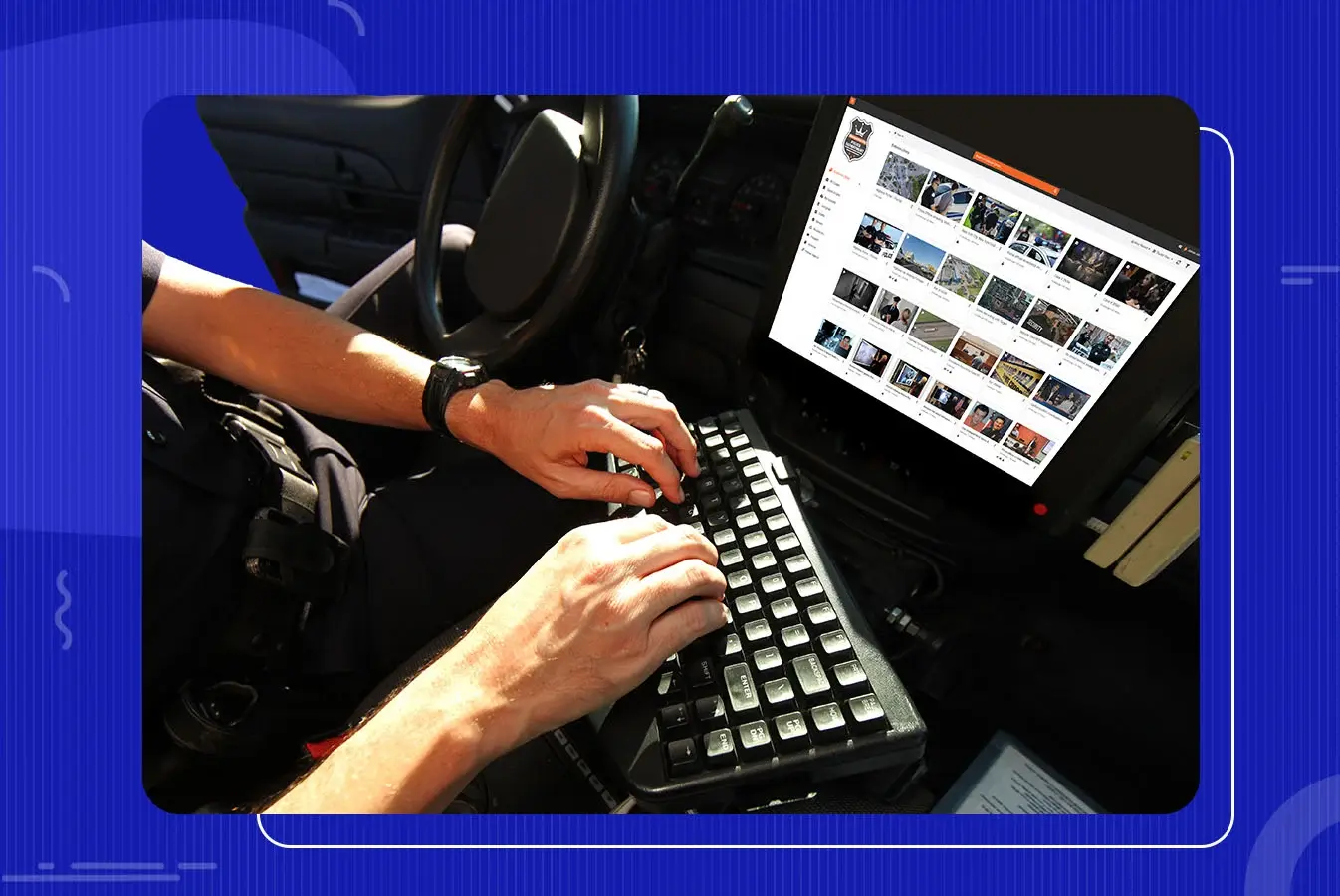 A police officer using a Digital Evidence Management system in a patrol car