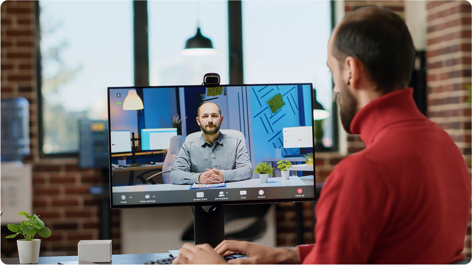 A person watching a streaming on the screen