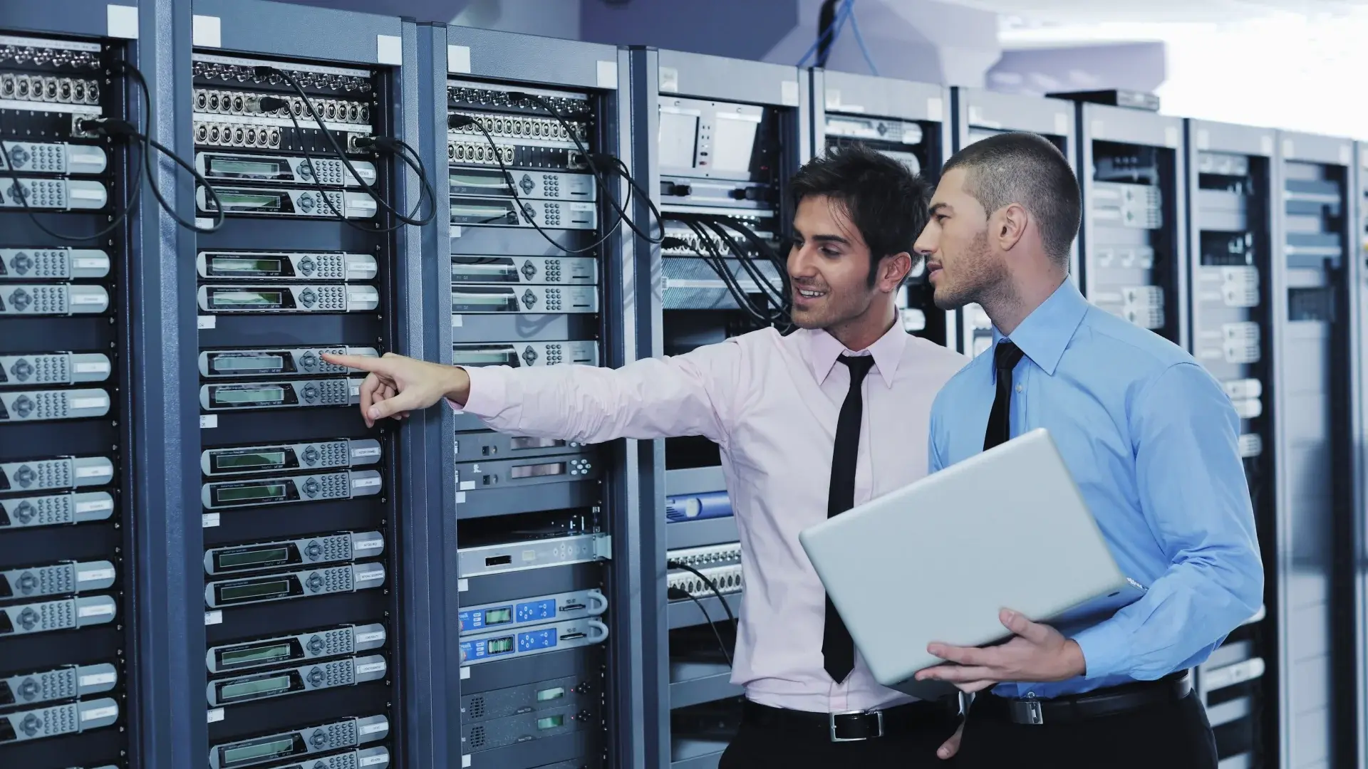 two person looking at on prem infrastructure