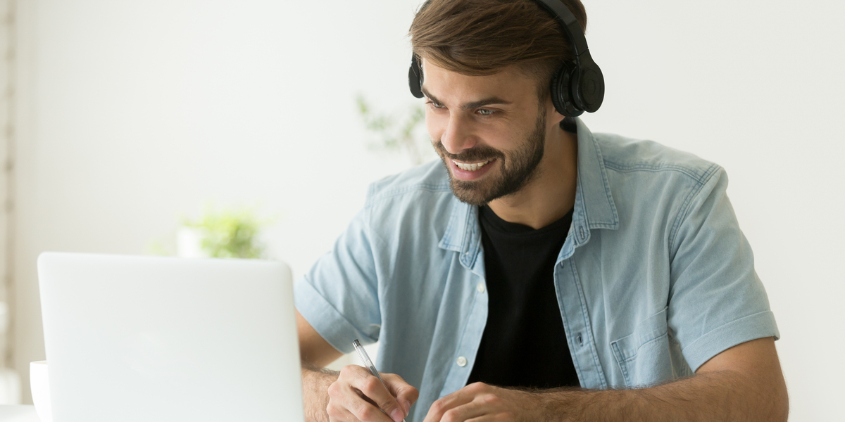 An employee watching Engaging Employee Onboarding Video