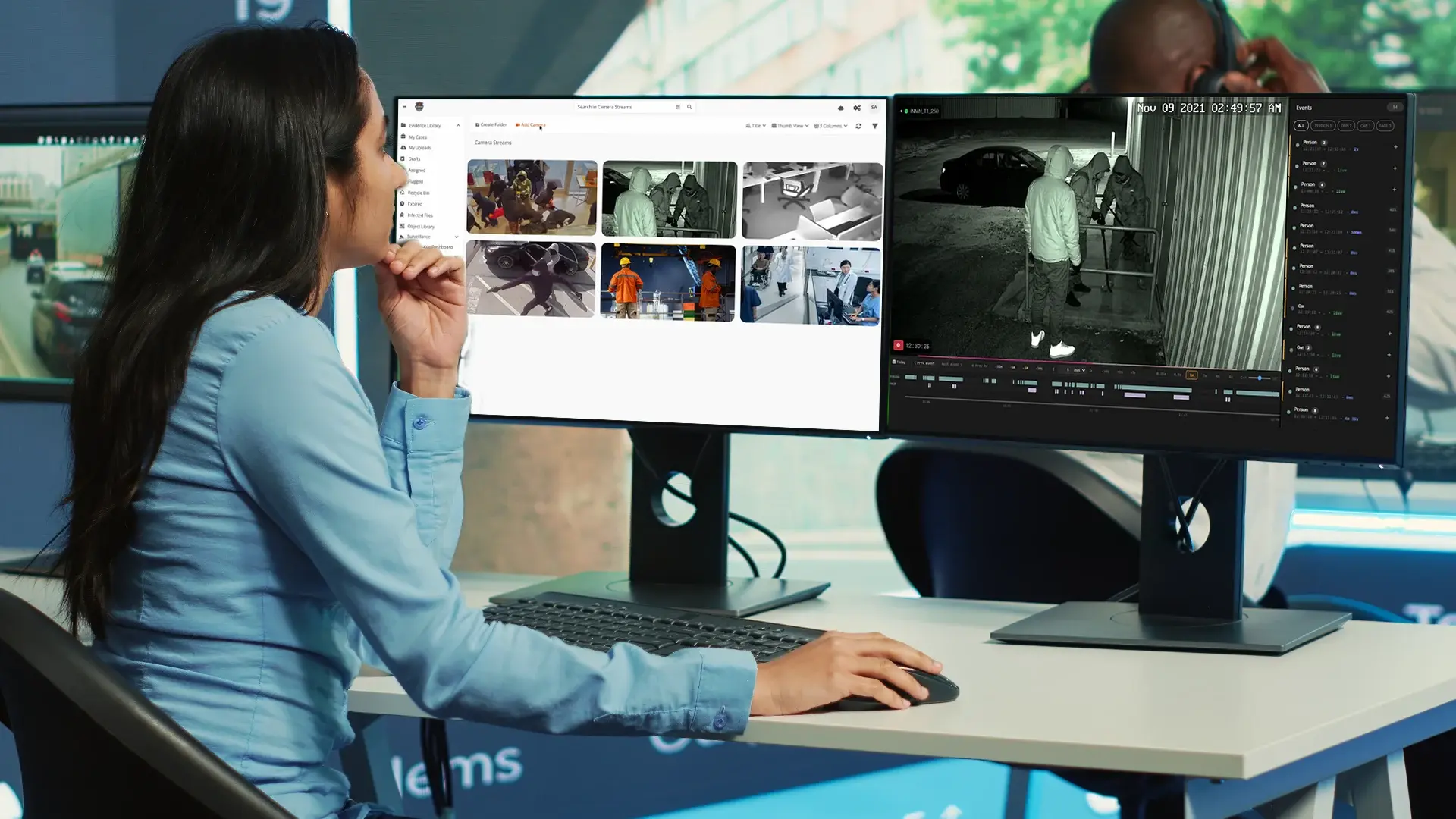 A person viewing multiple real time surveillance footages