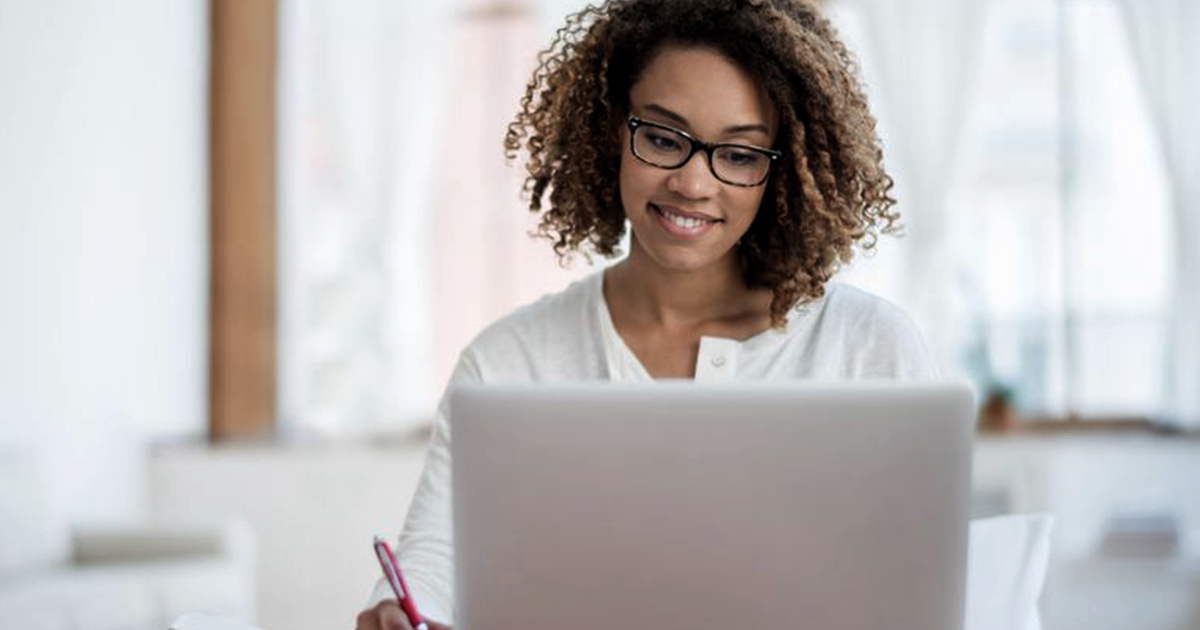 A woman using a laptop