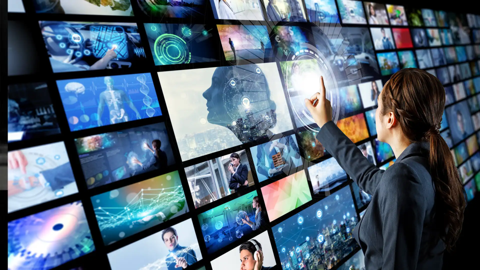 a depiction for a person touching a screen with videos