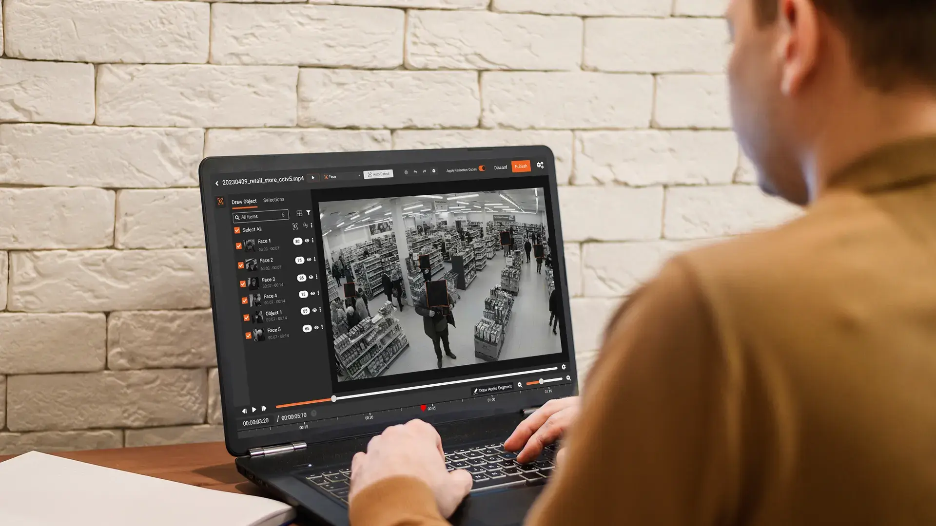 a person redacting a commercial CCTV footage using Redactor