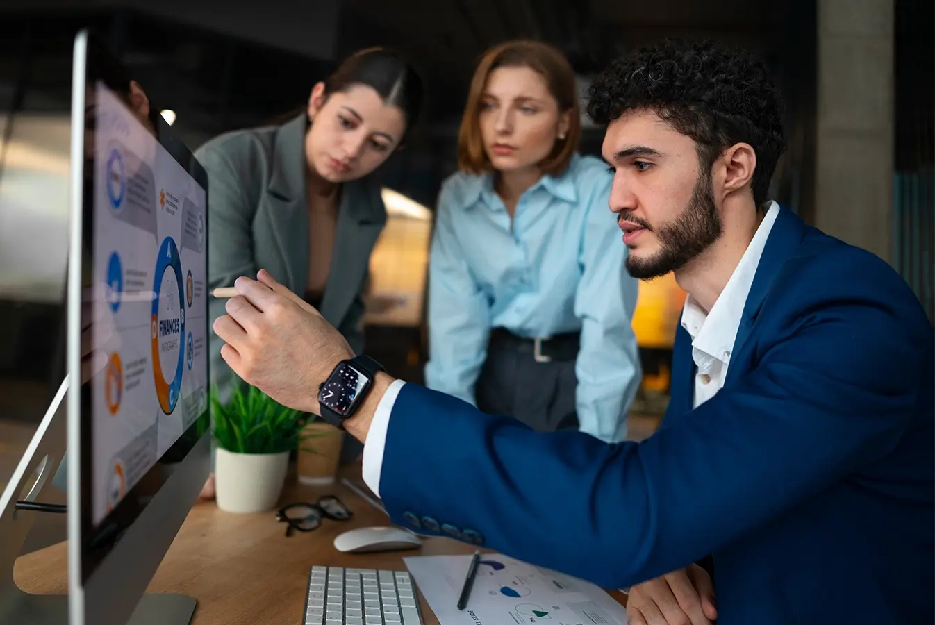 A corporate worker looking at video analytics on their screen