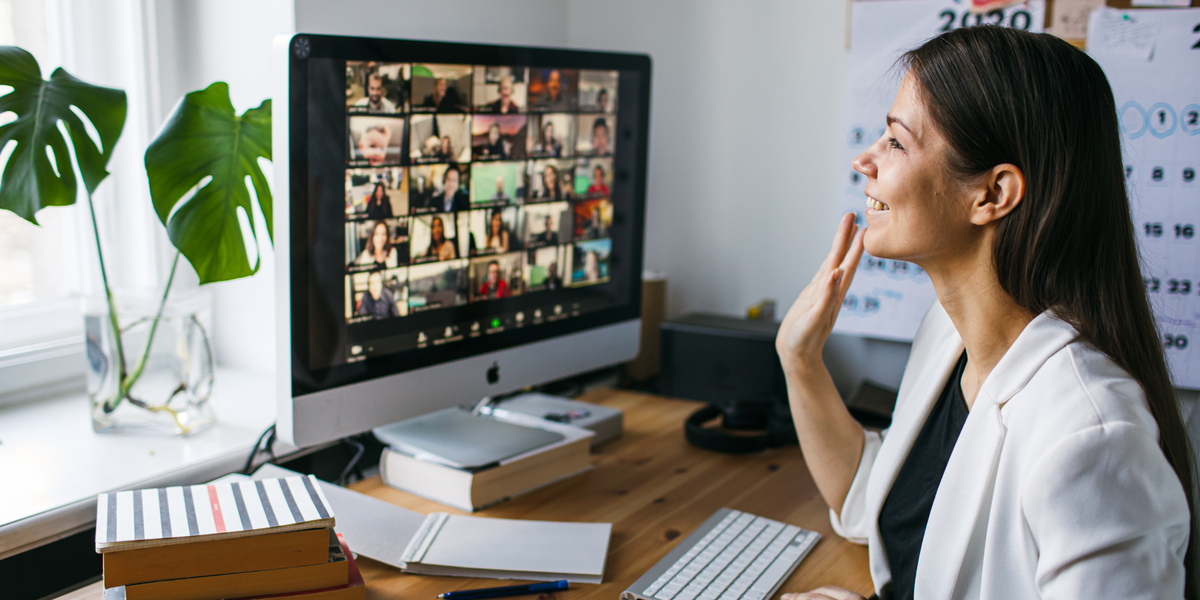 A person looking at a recorded Zoom meeting