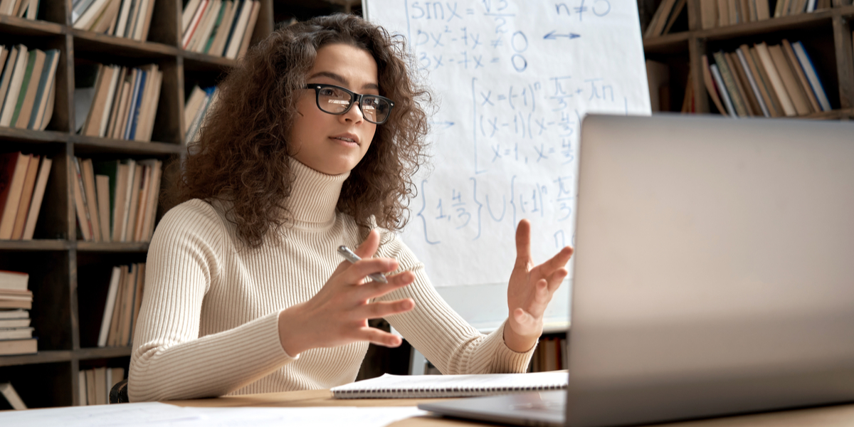 Woman creating a live webcast and in the middle of explaining an important concept