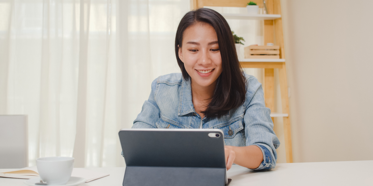 An employee watching a video on a tablet screen