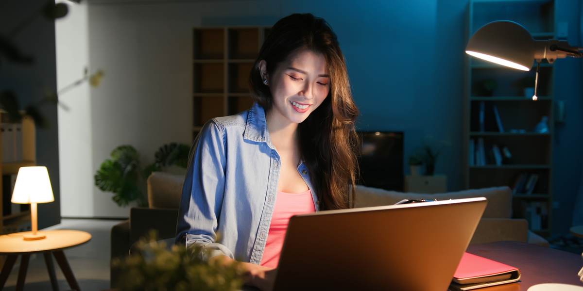 A woman Using a Laptop Computer