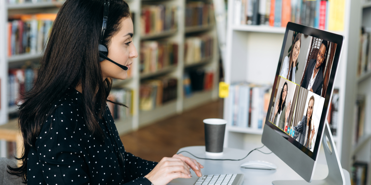 An employee attending an online Zoom meeting