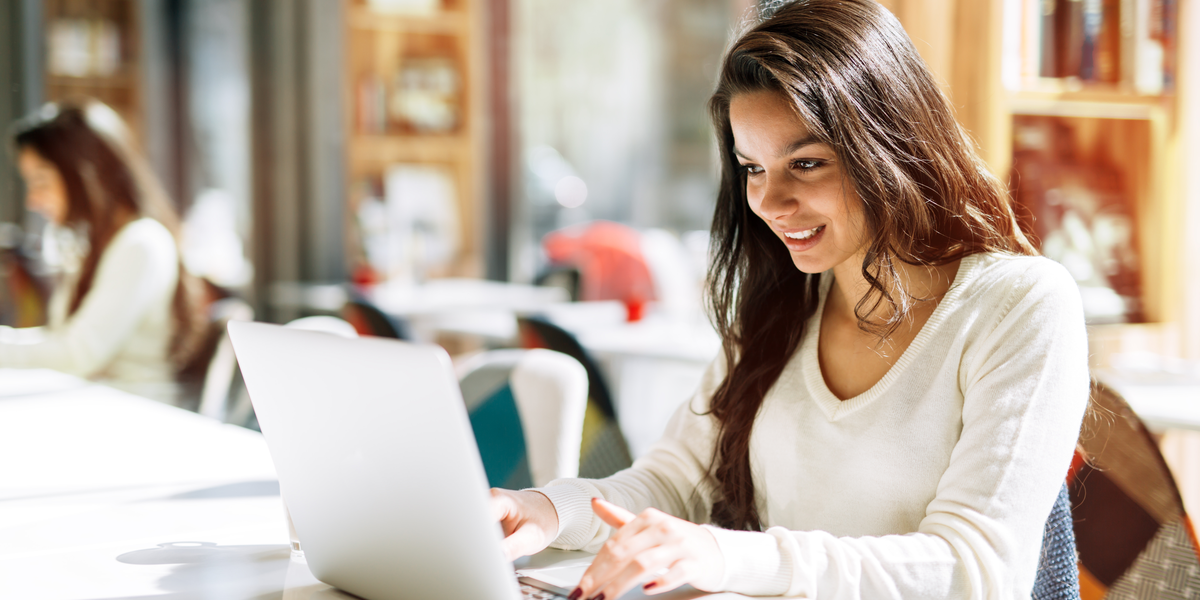 A woman using VPlayed video platform