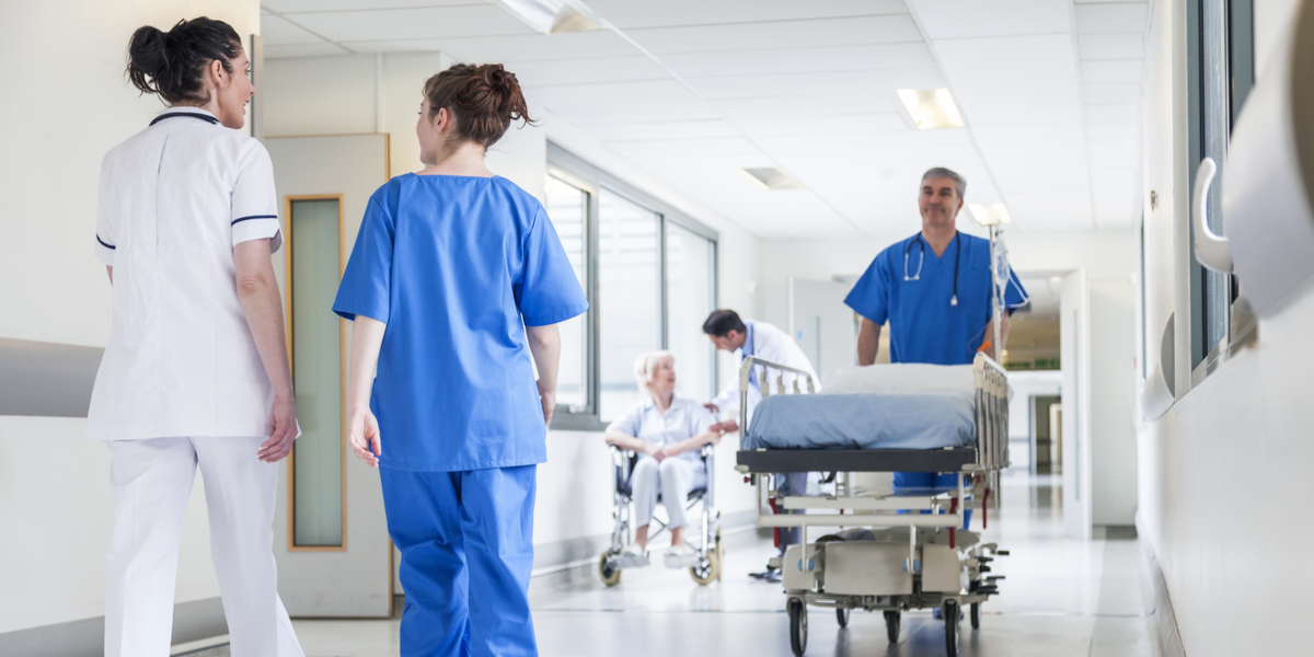 Doctors and Nurses Walking in a Healthcare Organization