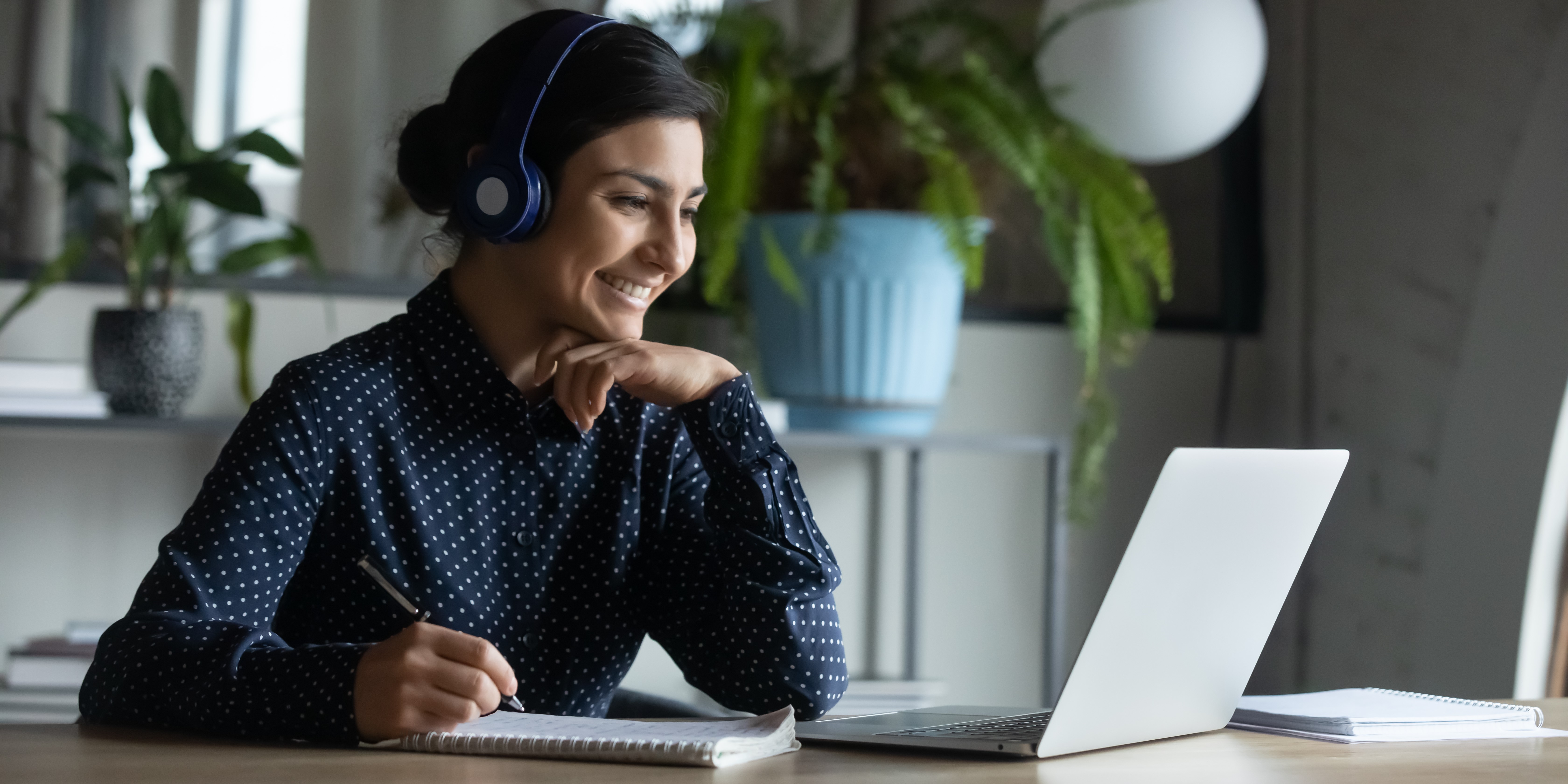 a lady using webinar for education